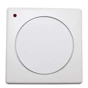 Close-up of a white rectangular device with a large circular dial and a small red indicator light in the top-left corner.
