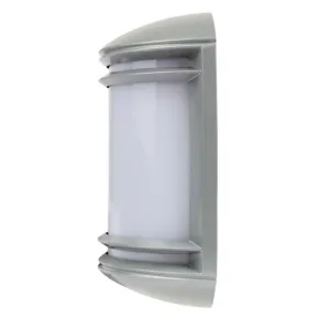 Close-up of a cylindrical outdoor light fixture with frosted glass and horizontal metal louvers on a vertical post